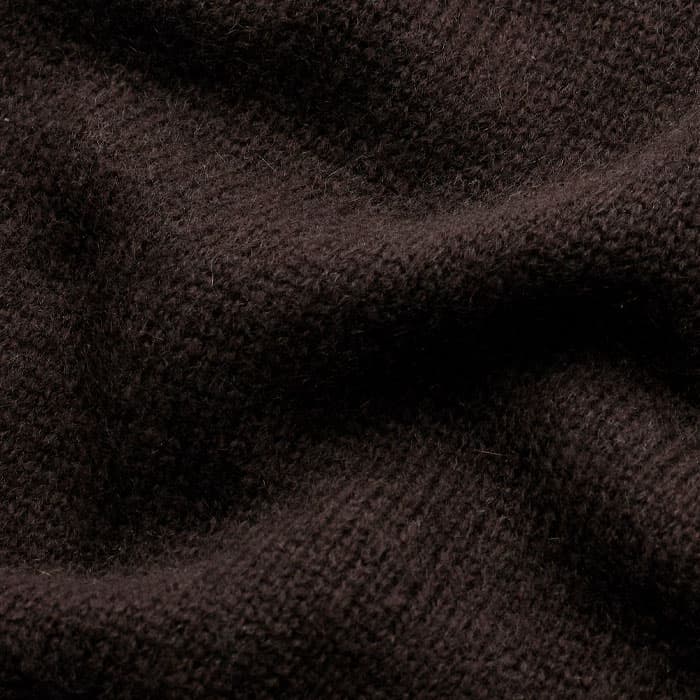 A delicate and luxurious blend of responsibly sourced merino wool, cashmere and silk with an incredibly soft hand feel and fluffy texture. 