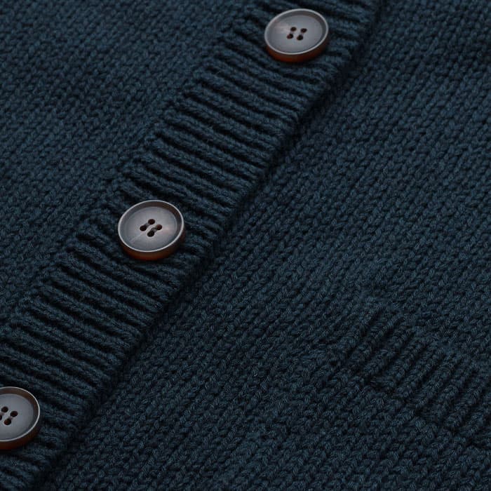 Knitted from a naturally breathable cotton and linen blend with a textured surface. 