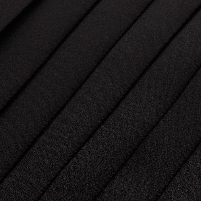 Crafted from fluid, matte-finish crepe that skims the figure and is pressed into crisp pleats. 
