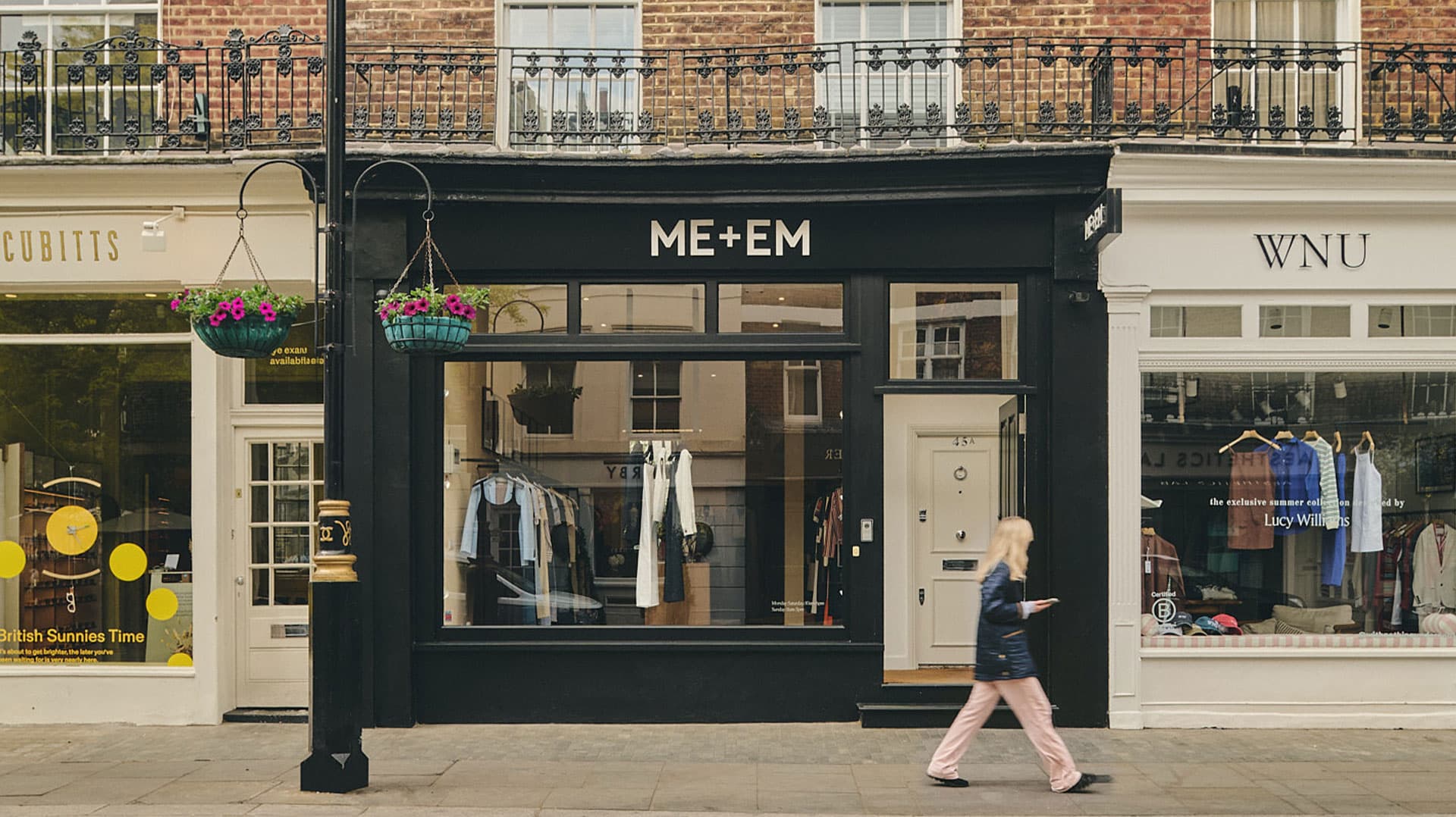 ME+EM Elizabeth Street outside store front with clothes hanging in window